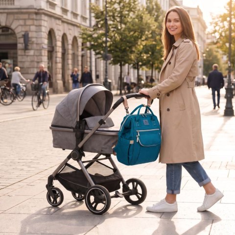 Plecak mommy-bag wykonany z poliestru w turkusowym kolorze, zamykany suwakiem - Peterson